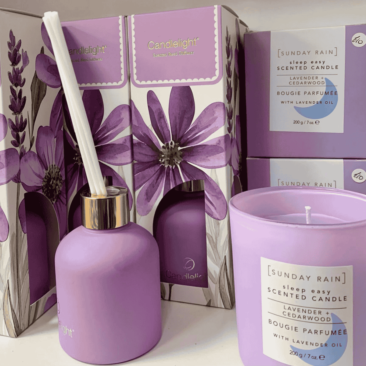 Purple candles and reed diffusers for sale at Aila Bells Gift Shop in Penicuik